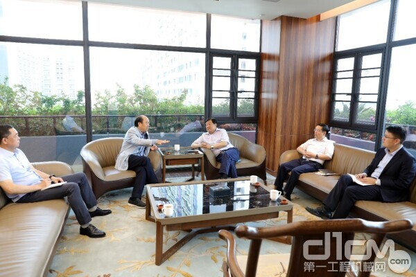 谭旭光与杨国强深入交流